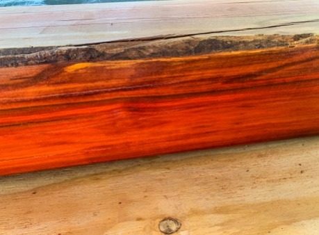 A richly grained tropical hardwood beam